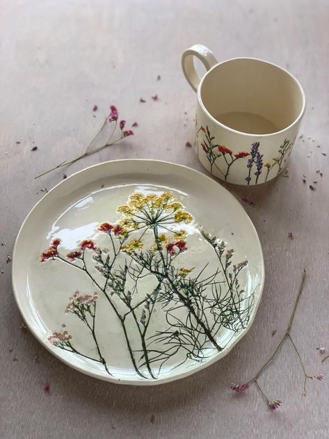 Assemblages of Found Florals Imprinted on Ceramic Mugs and Plates by Hessa Al Ajmani | Colossal Tanah Liat, Keramik Design, Slab Pottery, Wheel Thrown Pottery, Ceramics Pottery Art, Pottery Classes, Thrown Pottery, Ceramics Ideas Pottery, ดินปั้น Polymer Clay