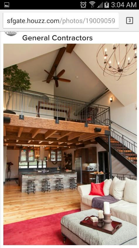 Loft over kitchen open to great room Stairs In Center Of Living Room, Modern Farmhouse Kitchens Rustic Industrial, Loft Above Dining Room, Loft Over Kitchen Ideas, Balcony Over Kitchen, Farm Loft House Design, Loft Over Kitchen High Ceilings, Barndominium Loft Railing, Barndominium Kitchen Island