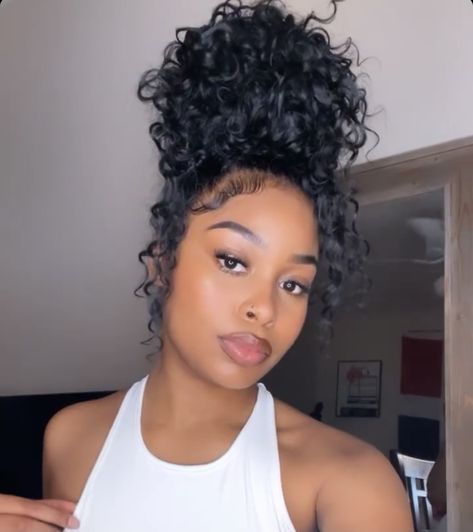 Updo Hairstyles For Black Women Curly Hair, Curly Bun Aesthetic, Curly Bun Black Women Weave, Top Knot Curly Bun, Cute Curly Ponytails For Black Women, Messy Curly Bun Black Women, Natural Curly Bun Black Women, Two Curly Buns With Weave, Curly Hairstyles Messy Buns