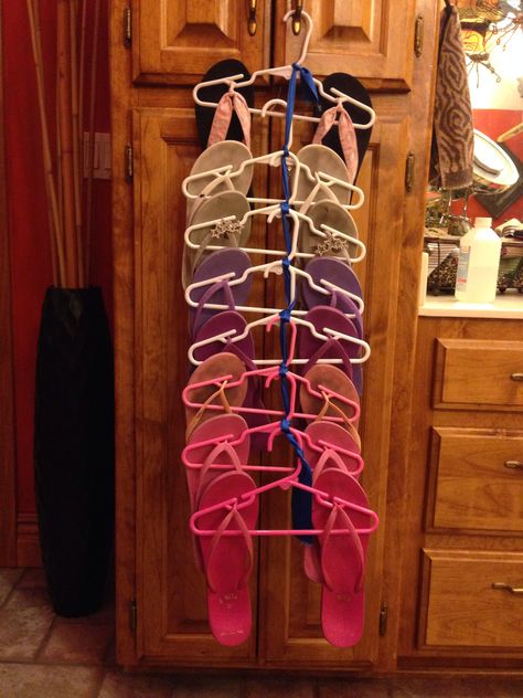 DIY flip flop hanger made by using children's hangers and a scrap piece of ribbon Flip Flop Hanger, Diy Hanging, Cleaning Organizing, Bathroom Makeover, Clothes Hanger, Flip Flops