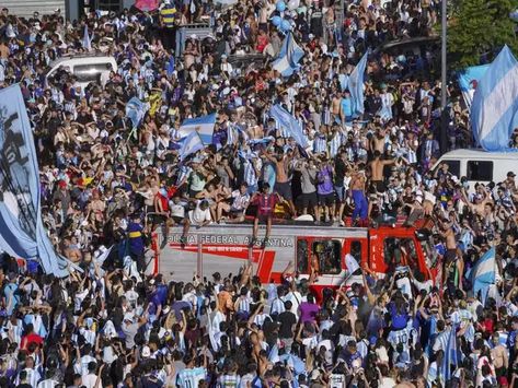 Fans going crazy on the streets after the win - Argentina supporters around the world rejoice over their team's victory in the 2022 FIFA World Cup final | The Economic Times Argentina Fans, Penalty Shootout, Messi Fans, World Cup Trophy, Penalty Kick, Champions Of The World, 2022 Fifa World Cup, World Cup Final, Team Effort