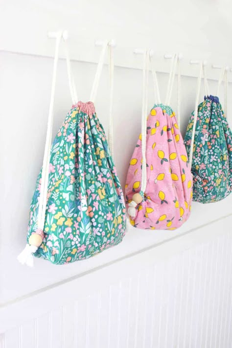 How To Sew A Drawstring Backpack - Easy Tutorial With Pictures Diy Drawstring Backpack Pattern, Easy Sewing Backpack, Diy Drawstring Bag Backpack, How To Sew A Drawstring Backpack, Kids Drawstring Bag, How To Sew Backpack, Easy Backpack Sewing Pattern, Draw String Backpack Pattern Free, Easy Drawstring Bags To Sew