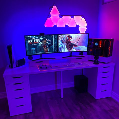 My gamer setup in blue, red and pink light, Ikea desk with custom-built PC, PS5 console, Nintendo Switch, Razer peripherals, dual monitors. Playing Marvel's Spider-Man: Miles Morales on PlayStation. Nanoleaf RGB panels light up pink. Gaming Pc Setup, Nanoleaf Lights, Game Setup, Gaming Desk Setup, Gaming Case, Best Gaming Setup, Spider Man Miles, Spider Man Miles Morales, Neon Bedroom