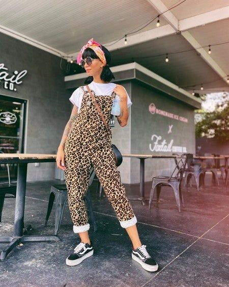 Edgy Jumpsuit Outfit, Leopard Dungarees Outfit, Leopard Print Dungarees, Lucy And Yak Styling, Patterned Overalls Outfit, Leopard Print Jumpsuit Outfits, Styling Vans Women Outfit, Music Festival Outfits Fall, Alt Overalls Outfit