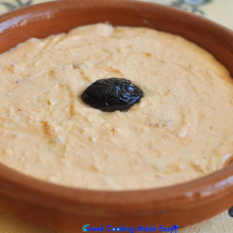 It is a great salty and spicy Greek spread! Also known as Ktipiti, its ingredients most commonly include feta cheese, hot and roasted peppers, olive oil & yogurt. It is eaten as part of a meze platter, or by itself, with slices of warm pita bread. #spread #dip #tyrokafteri #Τυροκαυτερή #greece #greek #greekrecipes #instafood #delicious #homecooking #lovefood #greekcookingmadeeasy #yummy #love #instagreece #igersgreece #foodlover #hellas #ελλάδα #mediterranean #greekfood #lovetocook #foodshare Spicy Feta, Meze Platter, Mezze Platter, Bread Spread, Pepper Dip, Stuffed Pepper Dip, Greek Cooking, Pita Bread, Roasted Peppers