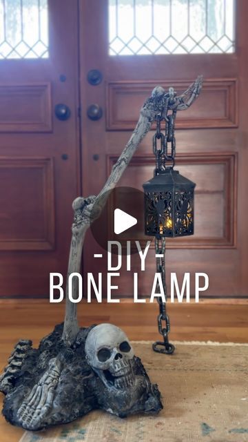 Mary Beth Wilhelm on Instagram: "DIY SKELETON BONE LAMP POST??? 🤣 🖤 ☠️ 🦴🔥 
Most materials used are from The Dollar Store!!! The loctite ($6.96) and spray paint ($5.98) were the most expensive materials for me. I had the styrofoam, paint and the bones. And again, Dollar stores and Walmart carry them if needed. 

Materials:

Plastic LIGHTWEIGHT skeleton bones. 
Lantern 
Chain 
Loctite
A box or styrofoam for your base
Black spray paint 
Black acrylic paint" Dollar Store Lanterns, Spooky Lantern Diy, Diy Grim Reaper Decoration, Spooky Dollar Tree Diy, Halloween Chains Decor, Diy Bone Decor, Dollar Store Halloween Ideas, Diy Skeleton Lamp, Halloween Styrofoam Crafts