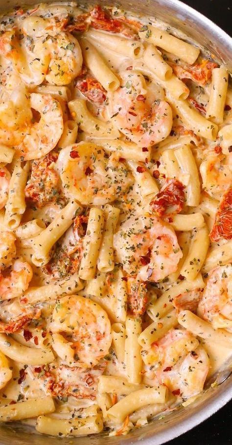 Shrimp Pasta in a deliciously creamy and cheesy Mozzarella sauce.  This easy weeknight dinner is made completely from scratch with sun-dried tomatoes, basil, and red pepper flakes. #shrimppasta #shrimp #pasta #seafood #dinner #Italianpasta #Italiandinner #Italianfood #creamypasta #creamyshrimppasta #recipe Mozzarella Sauce, Pasta Shrimp, Creamy Shrimp Pasta, Mozzarella Pasta, Recipe Shrimp, Resep Pasta, Pasta Italiana, Basil Pasta, Dried Basil