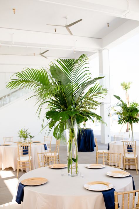 Paper Palm Centerpiece, Palm Frond Centerpiece, Tropical Table Centerpieces Diy, Palm Leaf Table Decor, Palm Frond Floral Arrangement, Tropical Round Table Decor, Palm Table Decor, Navy Blue And White Wedding Decorations, Palm Leaf Decor Wedding