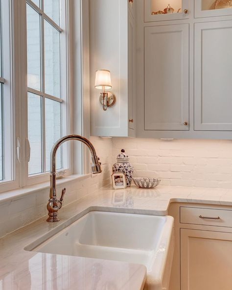 White Kitchen With Brick Backsplash, White Kitchen With Brick, Kitchen With Brick Backsplash, Cape Cod Kitchen Remodel, Cottage Kitchen Backsplash, Kitchen With Brick, Sconces In Kitchen, White Brick Backsplash, Farmhouse Sconces