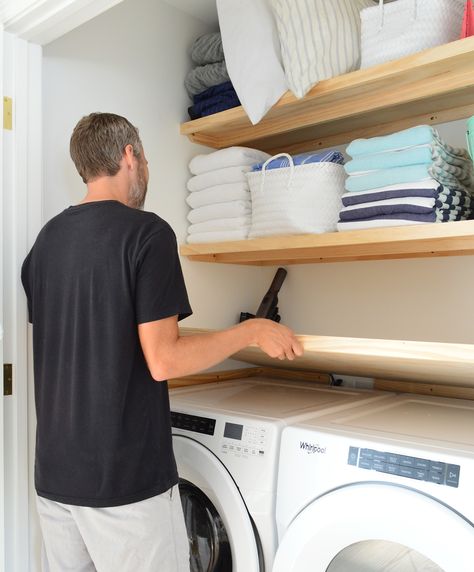 Some Quick & Extremely Functional Laundry Closet Shelves | Young House Love Build Shelves In Laundry Room, Laundry Room Closet Shelves, Laundry Nook Hallways, Laundry Closet With Wallpaper, Laundry Storage Shelves, Laundry Closet Front Loaders, Peg Board Laundry Room Organization, Small Laundry Closets, Laundry Closet Remodel