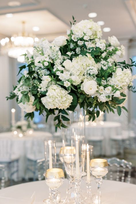 White flowers and lush greenery are a match made in heaven! 🌿 Doris Ione’s wedding centerpieces combine these elements to create an effortlessly chic and romantic look for your reception tables. Wedding Centerpieces White Flowers, White Flower Wedding Centerpieces, White And Green Centerpieces, Greenery White Wedding, Wedding Florals White, White And Greenery Wedding, White Wedding Florals, Floral Table Decor, White Wedding Centerpieces