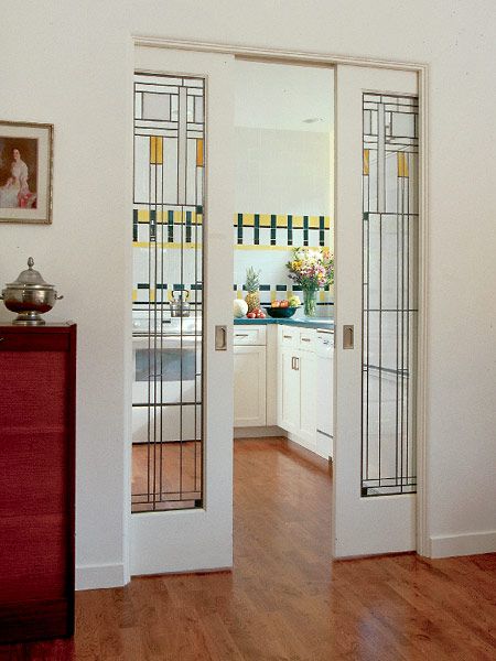 The design of these beautiful #pocketdoors echo the kitchen's #Craftsman-style tiles  | Photo: Roger Hardy | myhomeideas.com Craftsman Style Kitchen, Glass Pocket Doors, Stained Glass Door, Craftsman Style Home, Craftsman Style Homes, Room Doors, Pocket Doors, Craftsman House, Style At Home