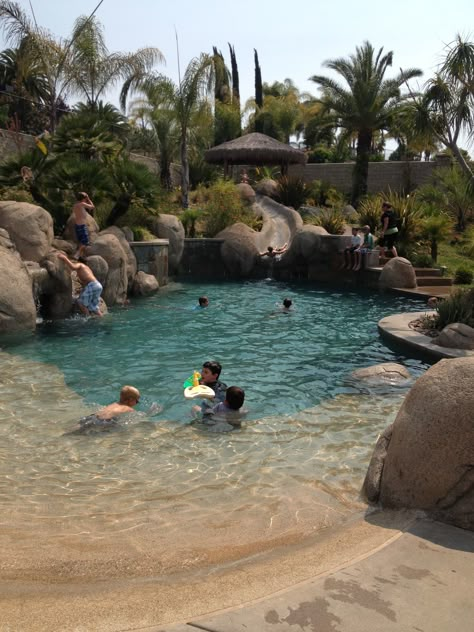 Pool with Jumping Rocks and baja step Jump Rocks For Pools, Rock Pools Backyard, Pool With Rocks, Pool With Jumping Rock, Pool Diving Rock, Pool Waterfall Jumping Rock, Sand Pool, Backyard Pool Grotto Rock Waterfall, Ideas De Piscina