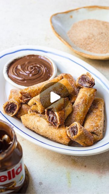 Shivesh Bhatia on Instagram: "Episode X #AtoZOfDesserts, a series where every letter unfolds a new delight 🥰 X for - Xangos💁🏻‍♂️ A delicious Mexican dessert, this fried tortilla cheesecake stuffed with creamy chocolate filling is perfect for when you are craving something sweet and crisp 🫶🏻  Ingredients: 🤌🏻1/2 cup cream cheese, softened  🤌🏻3 tbsp nutella 🤌🏻1 tbsp cocoa powder 🤌🏻2-3 tortillas 🤌🏻Cinnamon sugar (3 tbsp castor sugar + 1 tsp cinnamon powder)  🤌🏻Oil, for frying  Method   1.  Make the filling by taking softened cream cheese in a bowl and adding nutella and cocoa powder to it. Whisk it well so that everything is combined together and the filling is smooth and lump-free. Transfer this filling into a piping bag. 2. Next, take the tortilla and cut each tortilla into Easy Tortilla Dessert Recipes, Nutella Thanksgiving Dessert, Tortilla Ideas Snacks, Xangos Mexican Dessert, Tortilla Cheesecake, Desserts With Tortillas, Tortilla Nutella, Tortilla Dessert Recipes, Nutella Tortilla