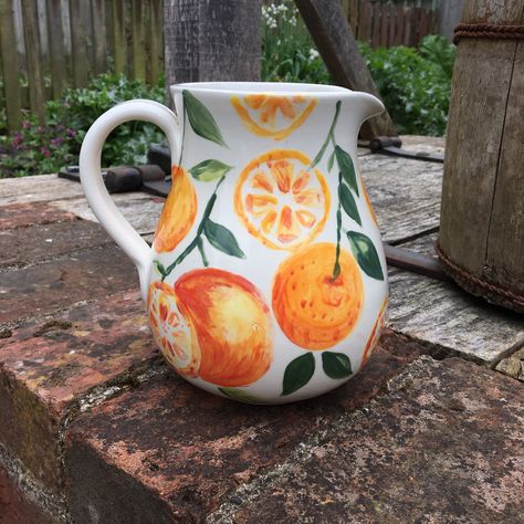 Hand painted ceramic jug 🍊 #oranges #seville #sevilleoranges #jug #ceramics #pottery #potterystudio #mothersdaygift #handpainted #handpaintedceramics Vintage Painted Pottery, Hand Painted Jug Ideas, Oranges Ceramic Painting, Paint It Pottery Ideas, Pottery Painting Ideas Pitcher, Painted Jug Ideas, Pottery Jugs Ideas, Painted Jugs, Jug Design