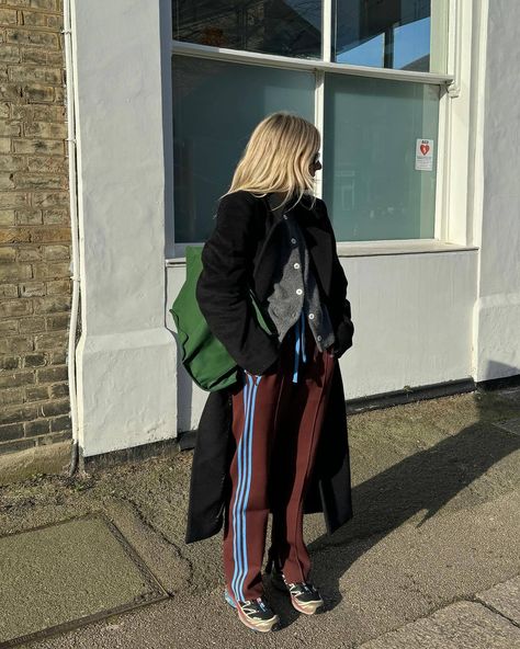 The Track Pants Trend Is The Most Comfortable Trend Of The Year | Who What Wear Track Pants Outfits, Adidas Track Pants Outfit, Tracksuit Outfits, Track Pants Outfit, Striped Wide Leg Trousers, Lucy Williams, Pant Trends, Adidas Track Pants, Outfit Formulas