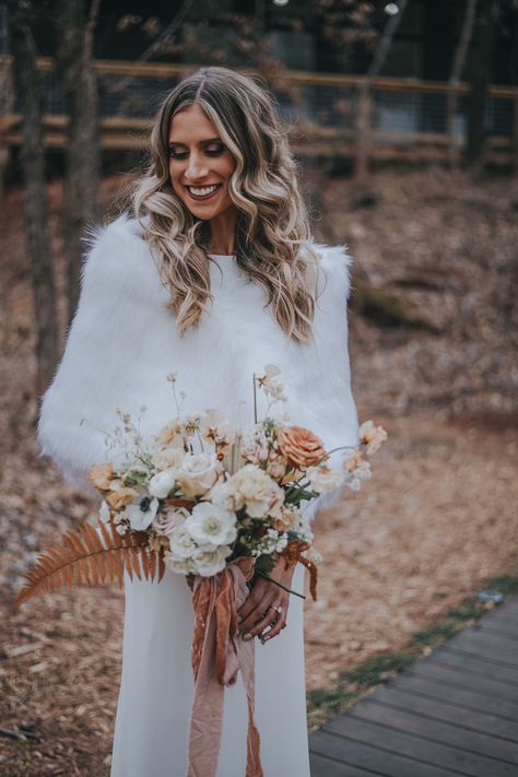 White faux fur coat