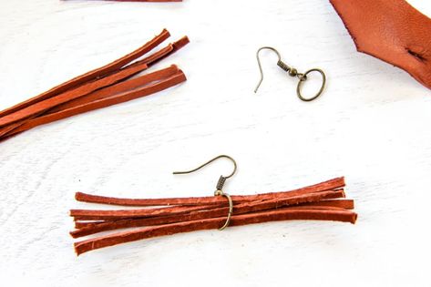 Leather Strip Earrings Diy, Diy Leather Tassel Earrings, Faux Leather Tassel Earrings Diy, Leather Earrings Tutorial, Making Leather Tassels Diy, Leather Cord Earrings Tutorials, Suede Cord Earrings Diy, How To Make Leather Fringe Earrings, Diy Leather Knot Earrings