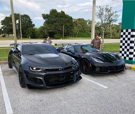 Chevrolet Camaro ZL1 1LE painted in Nightfall Gray Metallic next to a Chevrolet Corvette C7 ZR1 painted in Black  Photo taken by: @scofield_tyler on Instagram   Camaro owned by: @scofield_tyler on Instagram Cheverlot Camaro, Corvette C7 Zr1, Chevrolet Camaro Zl1 1le, C7 Zr1, Mustang Car Aesthetic, Camaro Zl1 1le, Camaro Ss Convertible, Chevy Camaro Zl1, Expensive Car