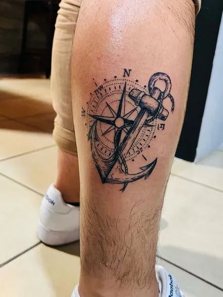 Anchor Calf Tattoo Men's Leg Tattoos, Anchor Tattoo Ideas, Simple Anchor Tattoo, Feminine Anchor Tattoo, Small Anchor Tattoos, Calf Tattoo Men, Navy Tattoos, Anchor Tattoo Design, World Famous Tattoo Ink