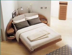 Placing your bed in the corner allows you several different setups. Corner Headboard, Furniture Names, Bookshelf Headboard, Fancy Bedroom, Bed Unit, Bed In Corner, In The Corner, Murphy Bed, Organization Bedroom