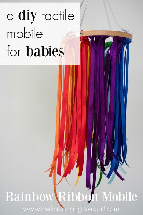 A DIY tactile mobile for babies. This easy rainbow ribbon mobile can be made in 20 minutes and keep babies entertained and engaged! Ribbon Mobile Diy, Diy Baby Sensory Toys, Diy Baby Toys 0-3 Months, Diy Baby Toys, Ribbon Mobile, Rainbow Sensory, Montessori Infant, Photo Mobile, Pinterest Baby