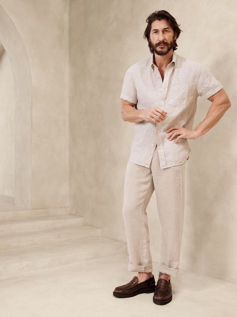 Luxurious, beautiful and naturally breathable, this linen shirt is crafted from 100% linen so it stays crisp and cool even in heat and humidity.  Standard fit.  Button-down collar with button-front closure.  Chest pocket.  Shirttail hem.  Standard fit.  Short sleeves.  Hip length.  Model: Size M, 6'2" (188cm). European Spring, Pool Party Fashion, Mens Linen Outfits, Wicked Costumes, Easter 2024, Linen Wedding, Oxford Shirts, Costume Inspo, Dad Fashion