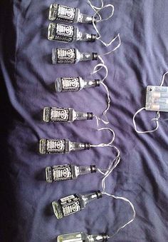 Jack Daniels Recipes, Alcohol Bottle Crafts, Jack Daniels Bottle, Liquor Bottle Crafts, Diy String Lights, Patio Tables, Alcohol Bottles, Jack Daniel, Glass Bottle Crafts