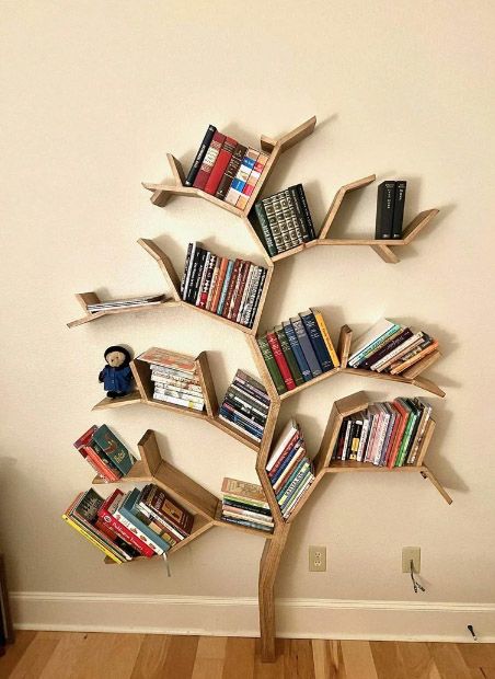 The Best Tree Bookshelves - BOOKGLOW Wooden Tree Bookshelf, Library Room Ideas School, Diy Tree Bookshelf, Tree Bookshelf Diy, Tree Bookshelves, Unusual Bookshelf, Branch Shelves, Bookshelf Tree, Tree Shelves