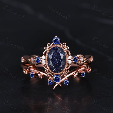 5x7mm Filigree Oval Blue Sandstone Bridal Ring Set Vintage Sapphire Leaf Engagement Ring Art Deco Women Promise Anniversary Ring Unique Gift Side stones: blue sapphire and moissanite This ring can also be made in genuine solid 10k, 14k, 18k gold or Platinum, and all the rings in my shop can be customized too! If you want to know more details about the ring, just contact with me anytime! If you want to customize the ring, just contact with me anytime! If you want to make a custom jewelry, just contact with me anytime! PROCESS TIME AND SHIPPING It usually takes about 3-4 weeks to finish the ring and 4-6 days to deliver to you if you are in US. (Free Shipping within US!) We will offer you the tracking number once your ring is shipped. WARRANTY 30 days money back guarantee! If you have any que Moissanite Sapphire Ring, Blue Goldstone Ring, Vintage Sapphire Engagement Rings, Wedding Ring Sapphire, Blue Sandstone Ring, Fairytale Engagement Rings, Blue Sandstone Engagement Ring, Sapphire Bridal Set, Art Deco Women