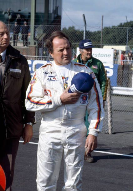 American racing driver AJ Foyt Junior holds his cap over his chest during action at the British Grand Prix at Silverstone England circa 1977 Aj Foyt, Watkins Glen New York, F1 Motor, Dan Gurney, United States Grand Prix, Mclaren Cars, F1 Cars, Watkins Glen, Motorsport Photography