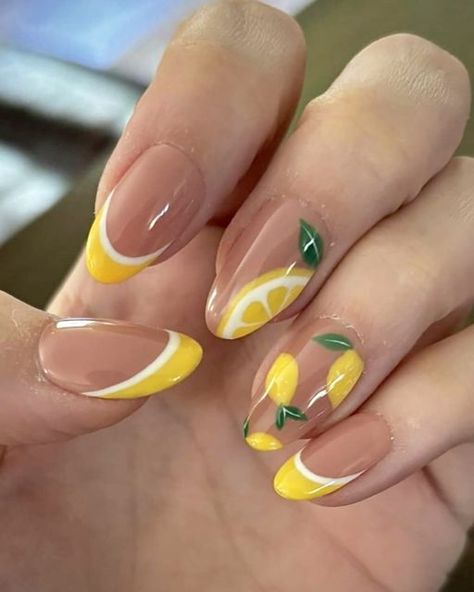 Bethany (Bee 🐝) | Luxury Press On Nail Artist on Instagram: "Love to see Ellen loving her latest set !! And they’re giving off summer vibes already!  🍋Who is on board with the lemon trend this season?  These are just SO cute 🤩   Short Round Après nails and that perfect glossy shine - you already know it’s @by.chloenails glossy top coat  #lemons #lemonnails #citrus #citrusnails #lemonnailart #fruitnails #fruitnailart #lemonnails🍋 #shortnails #frenchtips #doublefrench #yellownails #shortnailart #yellownailart #nails #pressons #presson #pressonnails #pressonnailsforsale #nailsnailsnails #nailsofinstagram #nailart #spring #springnails #springnailart #springnaildesign #seasonalnails #beeimpressednails #tpa #thepressoncollective" Lemonade Nails Designs, Limon Nail Art, Summer Nails Citrus, Lemon Nail Art Designs, Lemon On Nails, Yellow Nails With Lemons, Cute Lemon Nails, Lemon Nail Ideas, Short Lemon Nails