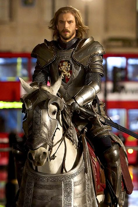 Dan Stevens as Bailey Horatio Brockton. Bailey is 23 years old and was only knighted a while back. Bailey was Aldrich's best friend and his squire. He offered (in this case, offered is more like told her in the case) to be her Champion, Evie accepting if only because she doesn't want some random person she's never met before to represent her and rather it be someone she is somewhat familiar with. Bailey is a bit self-righteous and somehow after Aldrich died, became very asshole-y and misogynist. Sir Lancelot, Joey Tempest, Arthurian Legend, Dan Stevens, Night At The Museum, By Any Means Necessary, Medieval Armor, Medieval Knight, Fantasy Armor