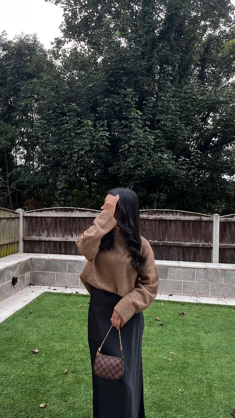 Silk Dress Jumper Outfit, Brown Midi Dress Outfit Fall, Long Brown Skirt Outfit Fall, Long Black Silk Skirt Outfit Winter, Midi Skirt Jumper Outfit, Jumper And Skirt Outfit Winter, Thanksgiving Outfit Modest, Long Skirt And Jumper, Winter Outfits Maxi Skirt