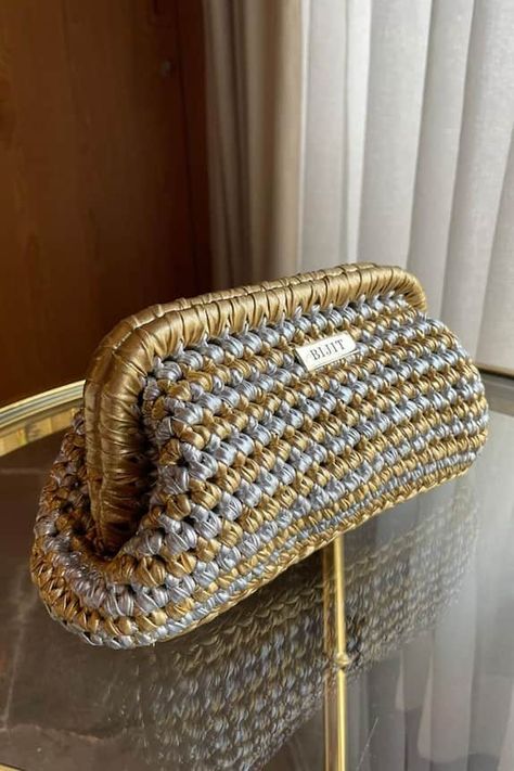 Golden and silver color block clutch with polyester yarn material woven pattern. Comes with a detachable sling chain. - Aza Fashions Crochet Sling Bag, Orion's Belt, Crochet Boho Bag, Diy Crochet Bag, Metallic Clutch, Crochet Business, Crochet Clutch, Crochet Basket Pattern, Crochet Fashion Patterns