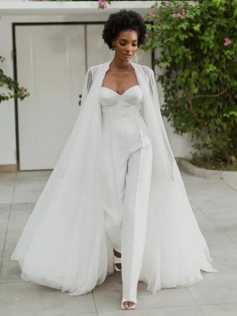 Imad Eduso long tulle bridal cape jacket for modern wedding look Wedding Pantsuit, Tulle Cape, Dress With Cape, Lace Cape, Cape Wedding Dress, Boda Mexicana, Bridal Jumpsuit, Bridal Jacket, Wedding Jumpsuit