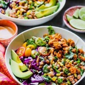 Southwestern Tempeh Taco Salad with Chipotle-Tahini - Dishing Out Health Vegan Salad Ideas, Chipotle Salad Dressing, Tempeh Salad, Best Vegan Salads, Tempeh Tacos, Avocado Salad Dressing, Tahini Recipe, Healthy Entrees, Taco Salads