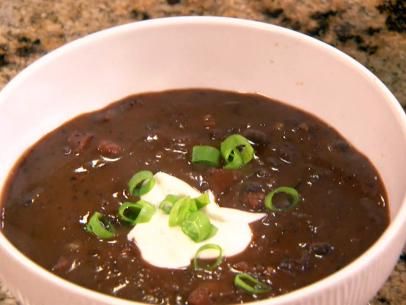 Spicy Black Bean Soup Recipe | The Neelys | Food Network Spicy Black Bean Soup Recipe, Spicy Black Bean Soup, Easy Black Bean Soup, Slow Cooker Black Beans, Black Bean Soup Recipe, Bean Soup Recipe, Bean Soup Recipes, Black Bean Soup, Canned Black Beans