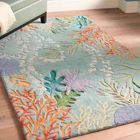 Be first to discover the next great find. Click here to view all of our indoor area rugs. Take the plunge and add this gorgeous wool rug to your home's d. With a design like a deep sea adventure, you'll enjoy the flora and fauna a coral reef under your feet. Hand-tufted, the skilled artisans capture the waving motion of the underwater world. Textural yarns and embroidery add to the impactful design. Elegant wool rug capturing the undersea world of corals and kelp ... Coastal Area Rugs, Coastal Rugs, Beach Cottages, On The Floor, Coral Reef, Beach House Decor, Indoor Area Rugs, Dream Room, New Room