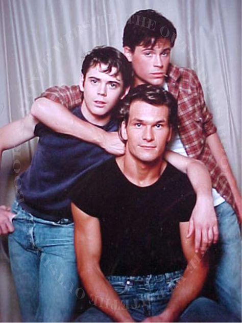 Patrick Swayze with C. Thomas Howell and Rob Lowe, as the Curtis Brothers in Francis Ford Coppola's The Outsiders (1983). The Curtis Brothers, Curtis Brothers, Lea Massari, Lisa Niemi, C Thomas Howell, Thomas Howell, The Outsiders 1983, Hottest Guys, Rob Lowe