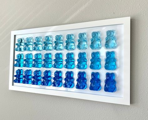 Colors gradient of blue Handmade out of resin Enclosed in resin for stronger structure. Gummy Bear: Large (3x2 inches) There are 2 frame variations:  - White Frame  - Black Frame Can make personalized versions upon request. If we have one in hand, we can ship in 1 - 2 business days. 3d Resin Art, Ocean Wave Wall Art, Geode Decor, Pop Art Wall, Bear Wall Art, Resin Crafts Tutorial, Resin Wall Art, Home Decor Handmade, Diy Resin Crafts