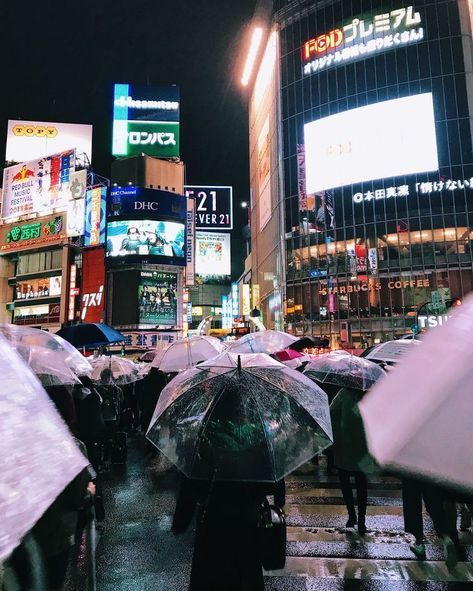 Shibuya Crossing, Tokyo, Japan  #shibuya #tokyo #japan #rain #umbrella #buildings #people #road #neon #signs #night #photography #streetphotography   Photo by Fred Rivett http://fredrivett.com Tokyo Aesthetic, Rainy Street, Tokyo Streets, Tokyo Japan Travel, Shibuya Crossing, Shibuya Tokyo, Tokyo City, Free City, Japan Culture