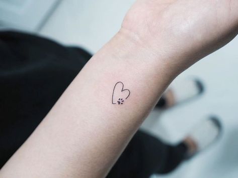 Heart And Paw Tattoo, Small Dog Tattoo Ideas, Tiny Wrist Tattoos, Pawprint Tattoo, Cool Wrist Tattoos, Music Tattoo Designs, Wrist Tattoos For Guys, Triangle Tattoos, Paw Tattoo