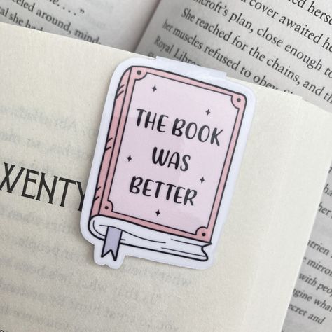 ✨ The Book Was Better Magnetic Bookmark  ✨ ✧ Size & Materials ✧ - Size: 1.3 in (W) x 2 in (H) - Printed in glossy photo paper and laminated. - Design is one-sided. -------------------------- ✧ Shipping Information ✧ - Purchases will be shipped within 1-3 business days. -------------------------- Instagram: @mooncrest.shop Please feel free to message me with any questions you may have. Classroom Shop, The Book Was Better, Magnetic Energy, Bookmark Size, Paper Art Design, Watercolor Bookmarks, Paper Moon, Magnetic Bookmarks, Book Art Diy