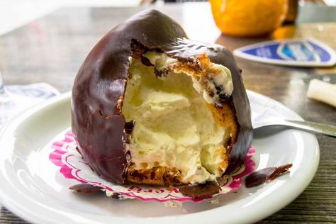 Bossche bol, one of the traditional foods in Den Bosch, the Netherlands. This Dutch sweet is a must-try in Brabant! #travel #denbosch #netherlands #nederland Dutch Recipes, European Desserts, Honey Pie, Black Forest Cake, Forest Cake, Den Bosch, Netherlands Travel, World Recipes, The Good Life