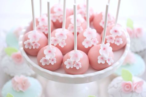 Cherry blossoms cakepops...For tutorials and more follow my Instagram account @sosweetbites Cherry Blossom Treat Table, Cherry Blossom Candy Table, Cherry Blossom Strawberries, Wedding Ideas Cherry Blossoms, Cherry Blossom Cake Pops, Quinceanera Cherry Blossom Theme, Cherry Blossom First Birthday, Wedding Cherry Blossom Theme, Cherry Blossom Treats