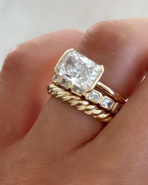 GOODSTONE on Instagram: "Swipe to get an up-close look at this stack featuring our Baby Bezel Band with East West Radiant Cuts. ✨ Obsessed is an understatement.  Want this look? Shop the link in our bio to get our new most popular wedding band. 💍  #engagementring #engagementrings #radiantcut #radiantcutdiamond #weddingrings #ringstack" East To West Emerald Wedding Band, East West Ring Stack, East West Wedding Band, East To West Ring, Radiant Cut With Wedding Band, Radiant Cut Ring Stack, East West Engagement Ring Stack, Wedding Stack Rings, Radiant Wedding Band