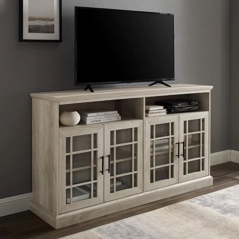 With all the flair of a traditional English manor, this sideboard maintains a stately presence without getting stuffy. This storage console can be used as a kitchen credenza where you can keep your cookbooks Kitchen Credenza, Tall Tv Stands, Living Room Storage Cabinet, Rustic Tv Stand, Storage Console, Wall Mount Electric Fireplace, Flat Panel Tv, English Manor, Party Dishes