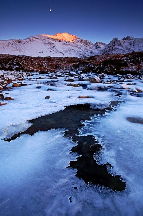 A frozen fairy pool in front of Bruch na Frith, Isle of Skye, Scotland Holiday Reminders, Run Photography, Scottish Isles, Moon Mountain, Mountain Sunrise, Isle Of Skye Scotland, Scotland Forever, Fairy Pools, Bonnie Scotland