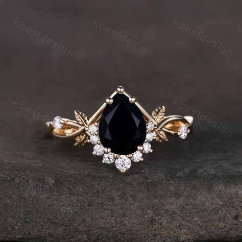 Vintage pear black onyx engagement ring yellow gold twig leaf wedding ring nature branch ring art deco moissanite bridal promise ring. Unique pear shaped ring, wedding ring, promise ring, anniversary gift. Main Stone: 6x8mm pear shaped black onyx Side stone: Moissanite  *I accept custom making order.Please contact me if you need this service. This ring is marked S925/G10K/G14K I accept custom making order.Please contact me if you need this service. For all the jewelries,there is a 14 days money Halloween Wedding Rings, Black Onyx Engagement Ring Vintage, Vintage Gold Wedding Ring, Obsidian Engagement Ring, Black And Gold Wedding Ring, Onyx Rings Women, Unique Engagement Rings Onyx, Onyx Gemstone Rings For Wedding, Black And Gold Engagement Ring